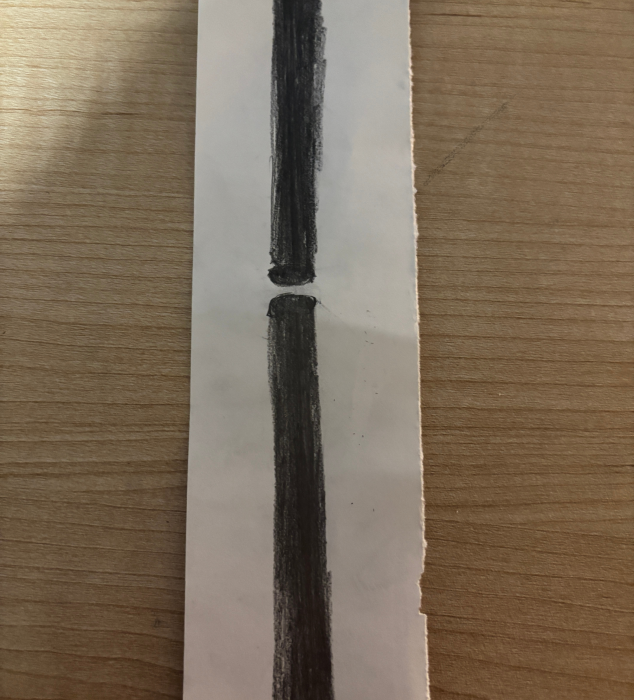 Circuit lines drawn with graphite.