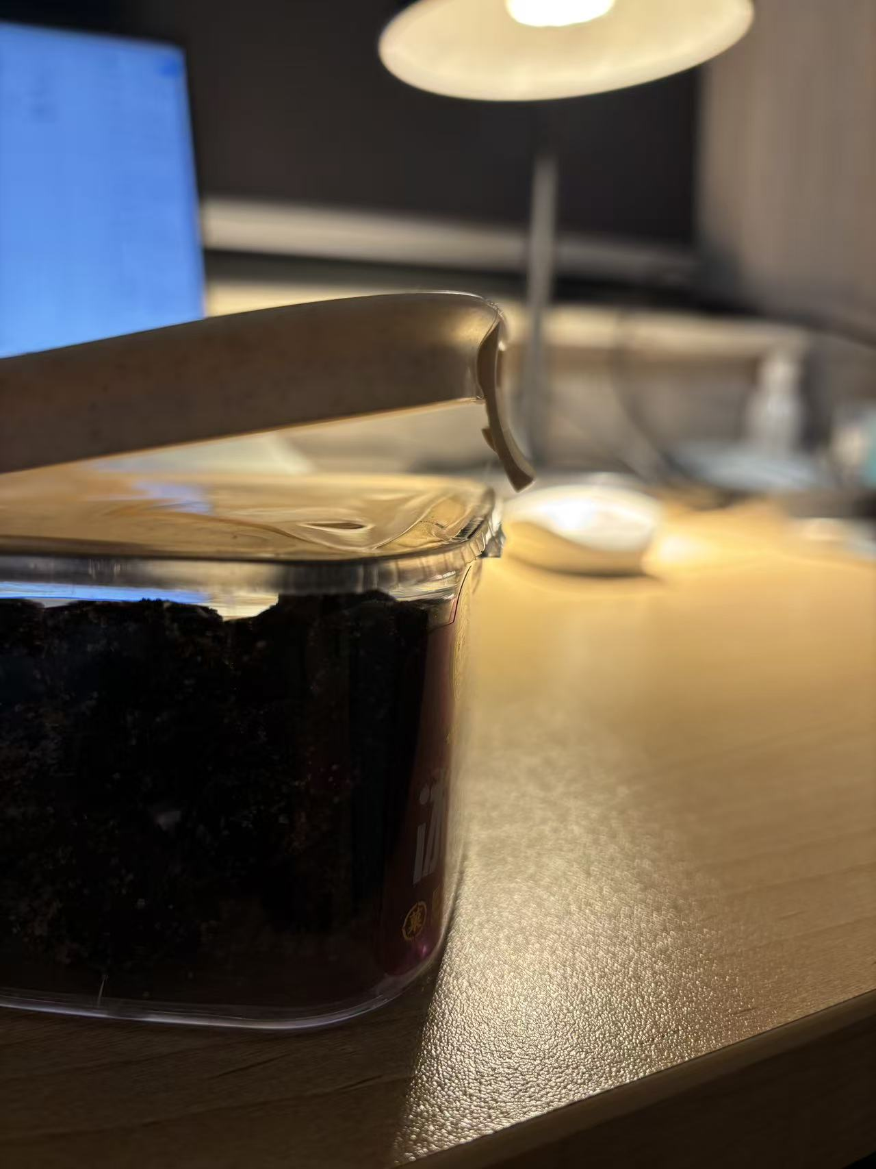 A partially opened snack storage box.