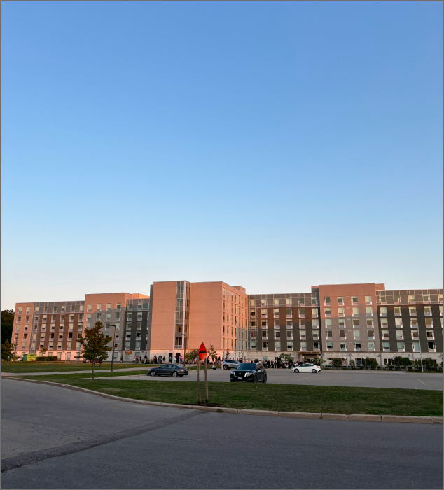 The photograph depicts the exterior architectural structure of the school's Dormitory Building No. 2.