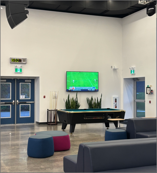 The scene depicted in the photo is the northeast corner inside the first floor of the SSU building at Sheridan School.