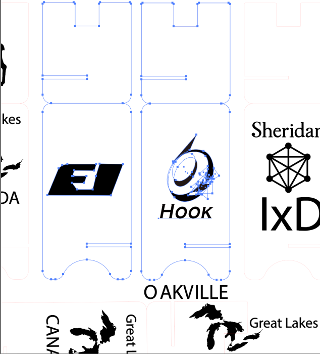 The photo shows a screenshot of editing two logos for wood panel cutting using AI software.