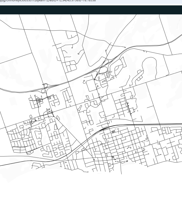 The image shows a black-and-white line road map in Mapbox, emphasizing the transportation network.